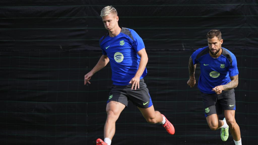 Dani Olmo e Iñigo Martínez, en un entrenamiento previo al Barça-Bayern de Champions League