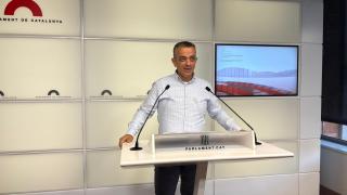 El portavoz de Élite Taxi, Tito Álvarez, en rueda de prensa en el Parlament