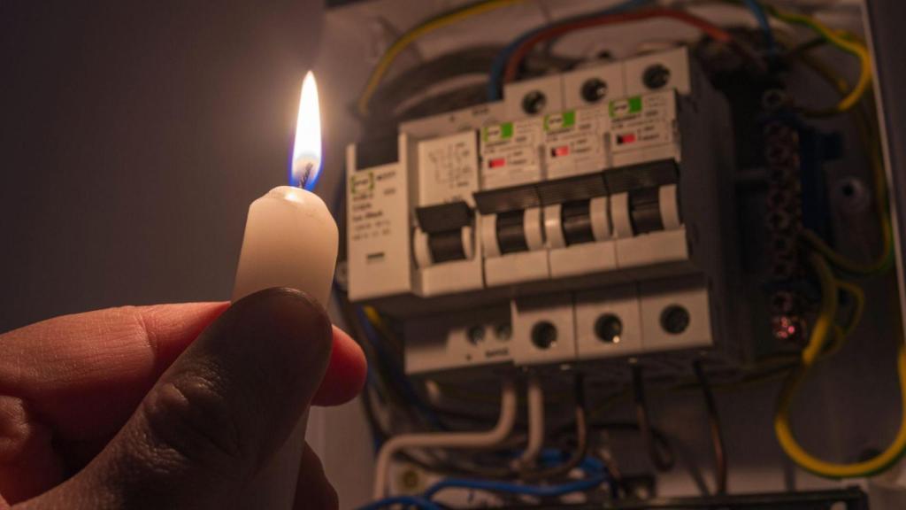 Cuadro de luces y vela