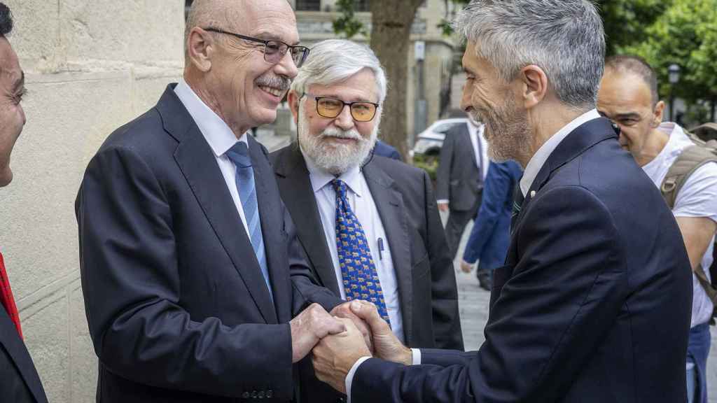 El secretario general adjunto de Naciones Unidas, Vladimir Voronkov, el director del Memorial, Florencio Domínguez, y el ministro del Interior, Fernando Grande-Marlaska.