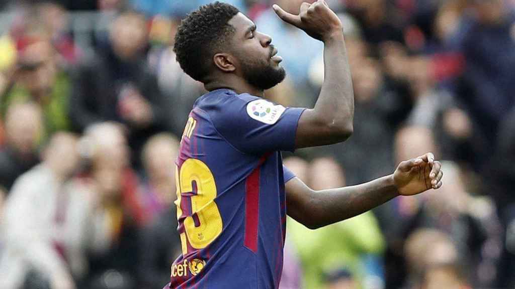 Umtiti celebrando el segundo gol del Barça contra el Valencia / EFE /ANDREU DALMAU