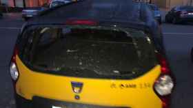Taxi con la luna trasera rota / Élite Taxi