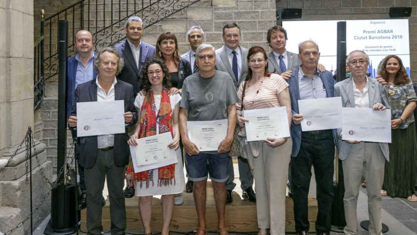 Ángel Simón, con los premiados