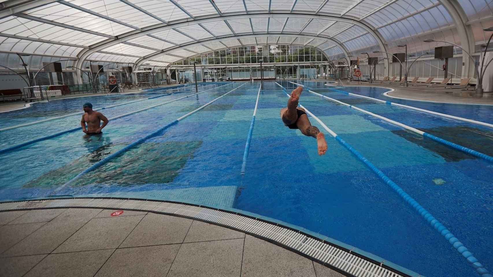 Dos nadadores en una piscina de los clubs DIR / EFE