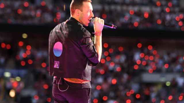 Chris Martin, vocalista de Coldplay, durante un concierto en Londres / Suzan Moore/PA Wire/dpa