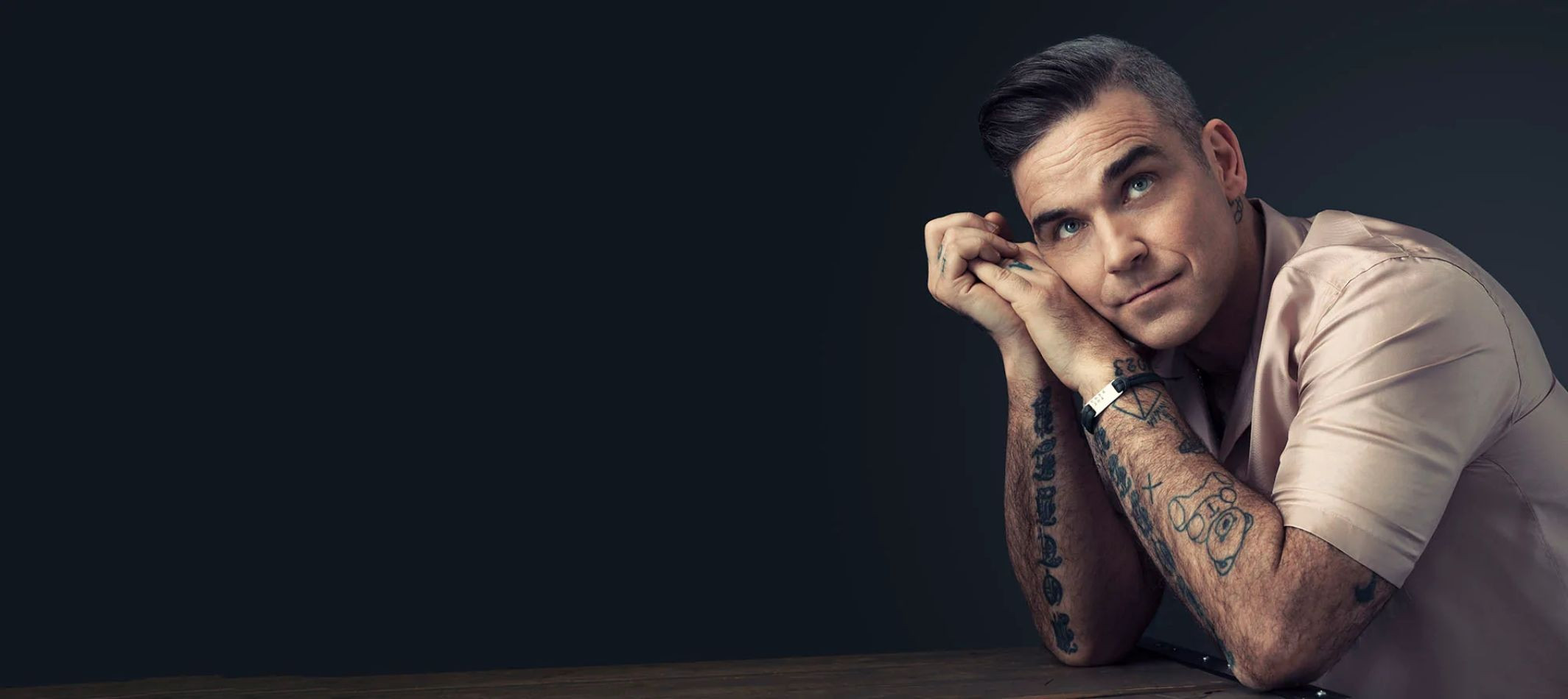 Imagen promocional de la gira de Robbie Williams / ROBBIEWILLIAMS.COM