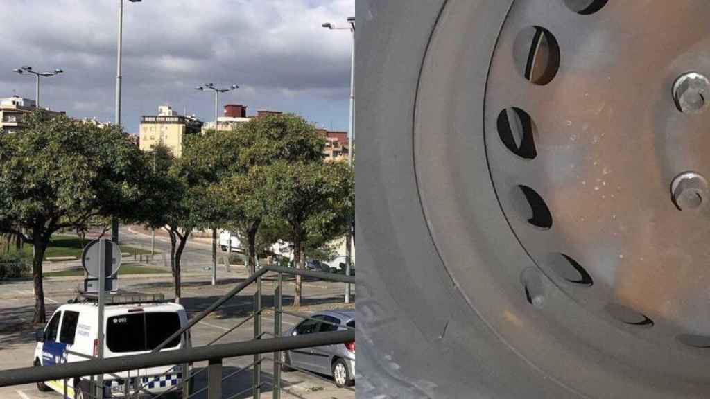 Exterior de la comisaría de Badalona y una rueda de un coche patrulla reventada / METRÓPOLI