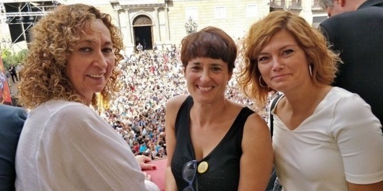 ECapella, Eva Baró y Alamany durante unas fiestas de la Mercè, de izquierda a derecha