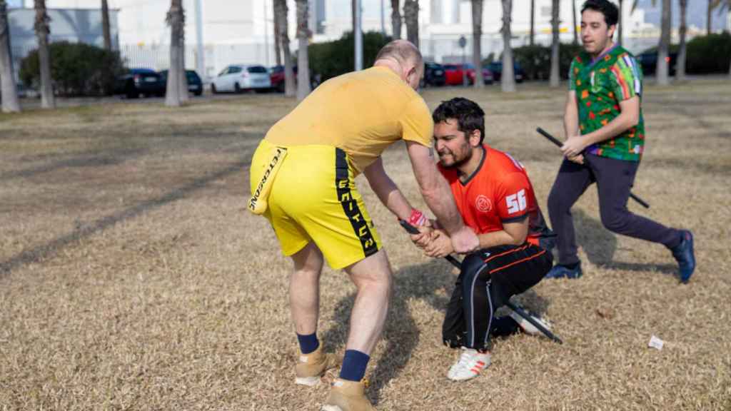 Dos jugadores intentando coger la esnitx