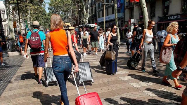 Turistas en la Rambla de Barcelona